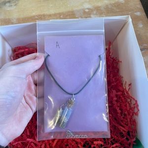 Handmade beach in a bottle necklace